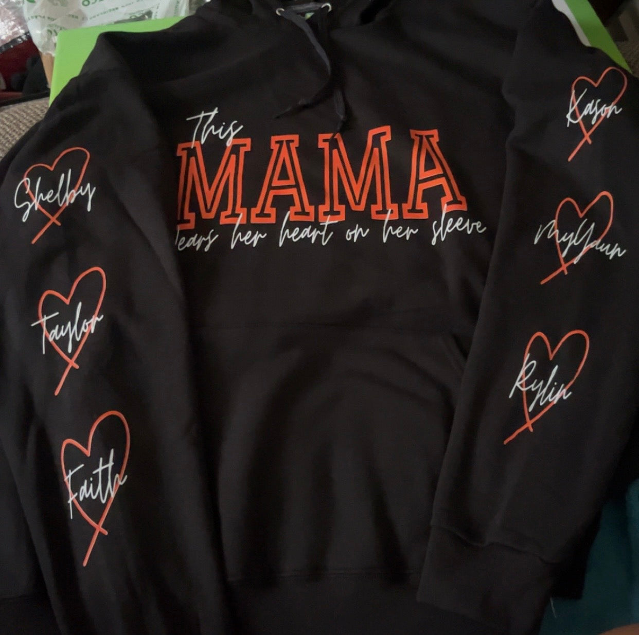 Custom “This MAMA wears her heart on her sleeve” Adults and Youth sizes Hoodies, Sweatshirts, Shirts EMAIL MTDesignz.shop@gmail.com After Purchase for Customization