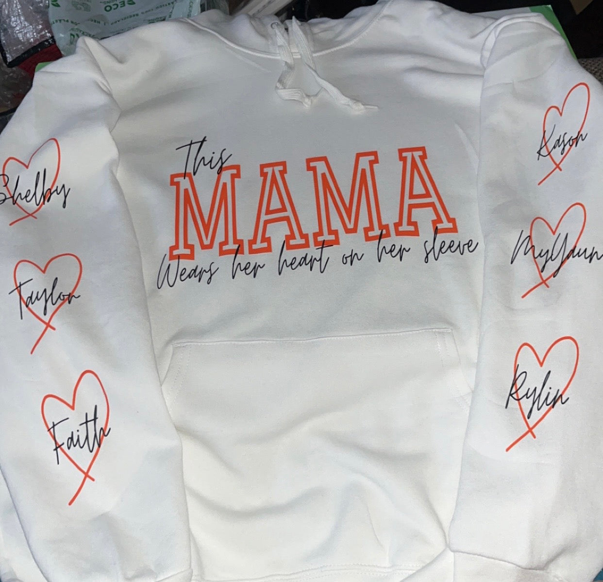 Custom “This MAMA wears her heart on her sleeve” Adults and Youth sizes Hoodies, Sweatshirts, Shirts EMAIL MTDesignz.shop@gmail.com After Purchase for Customization